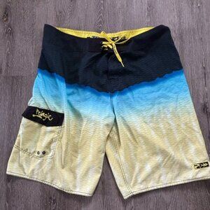 PELAGIC TUNA BOARDSHORTS Men's sz 38 Blue Yellow Dip Fish Scales Swim Trunks